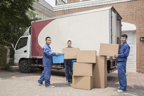Careful loading of student belongings from a Haringey flat share