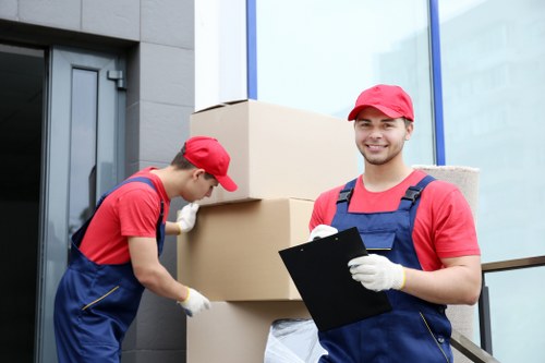 Team confirming a house removal booking details