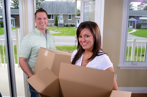 Packing and loading office furniture for a local business relocation