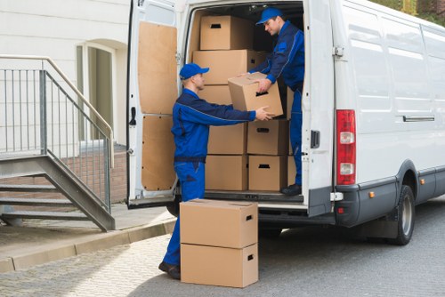 Local movers packing fragile items for a flat or house move in Haringey