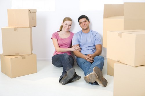 Prepared boxes and furniture ready for a man with van service in Haringey