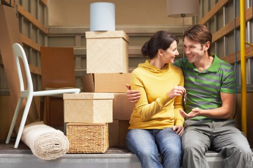 Careful moving of bulky furniture through a residential property in Haringey