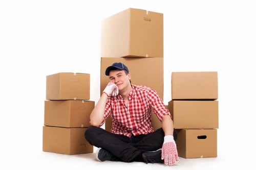 Protective wrapping and careful lifting used for piano removals
