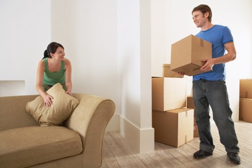 Moving items through a stairwell in a Haringey flat conversion